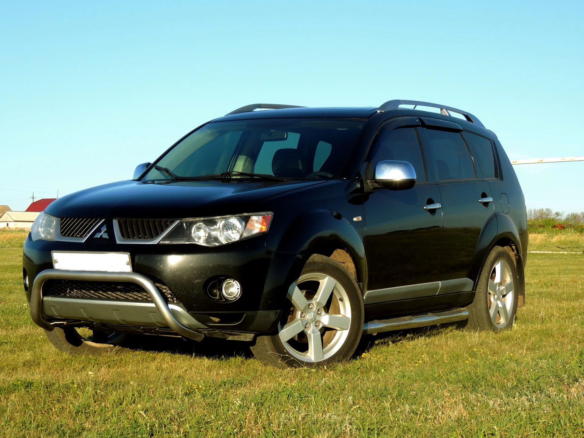 Мицубиси аутлендер хл 2008. Mitsubishi Outlander XL 2008. Mitsubishi Outlander XL 2.4 2008. Mitsubishi Outlander 2 XL. Митсубиси Аутлендер IX L.