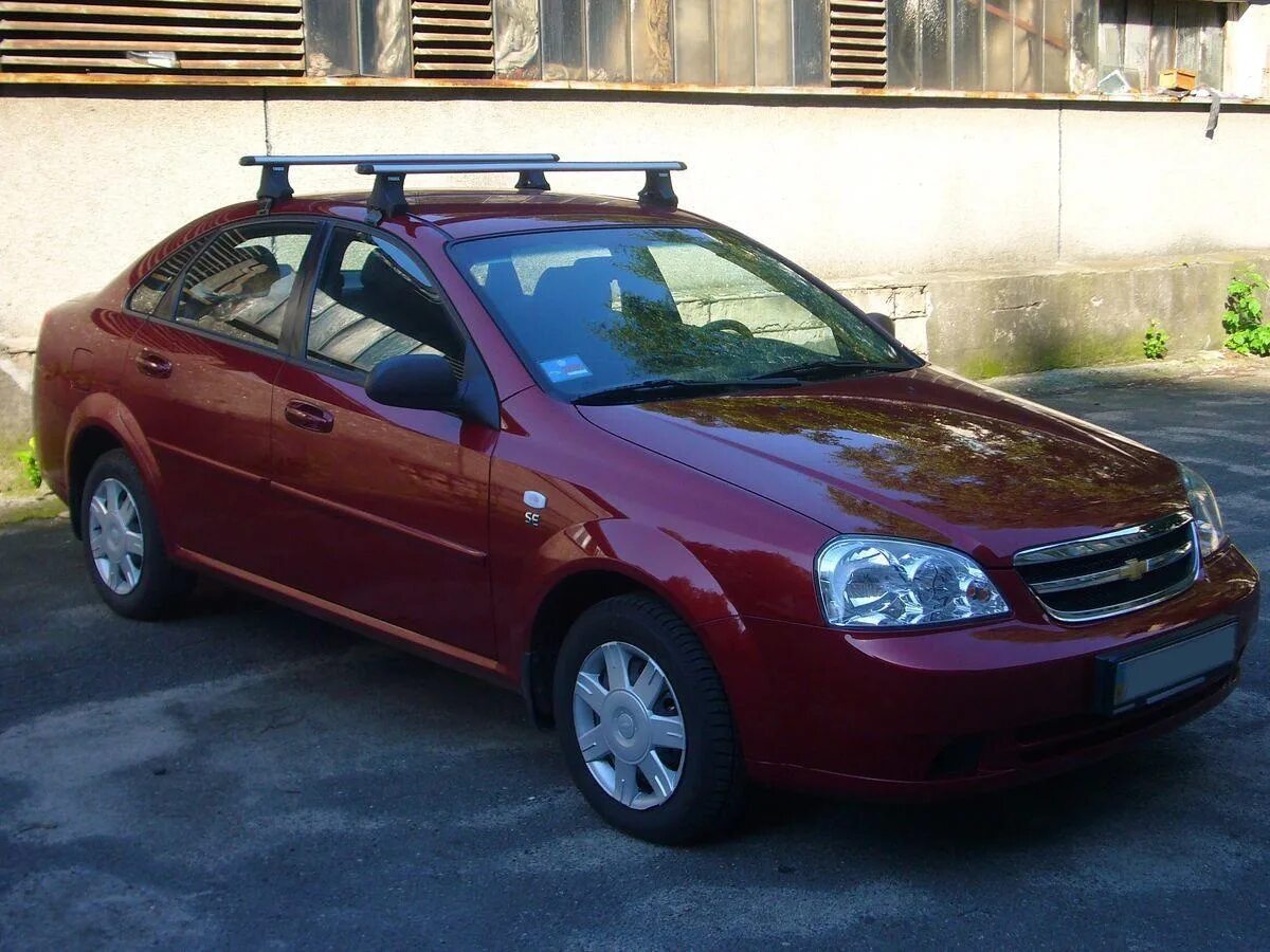 Купить багажник шевроле лачетти. Лачетти багажник Lux. Багажник на крышу Chevrolet Lacetti. Багажник Лачетти седан. Багажник на крышу Chevrolet Lacetti Lux.