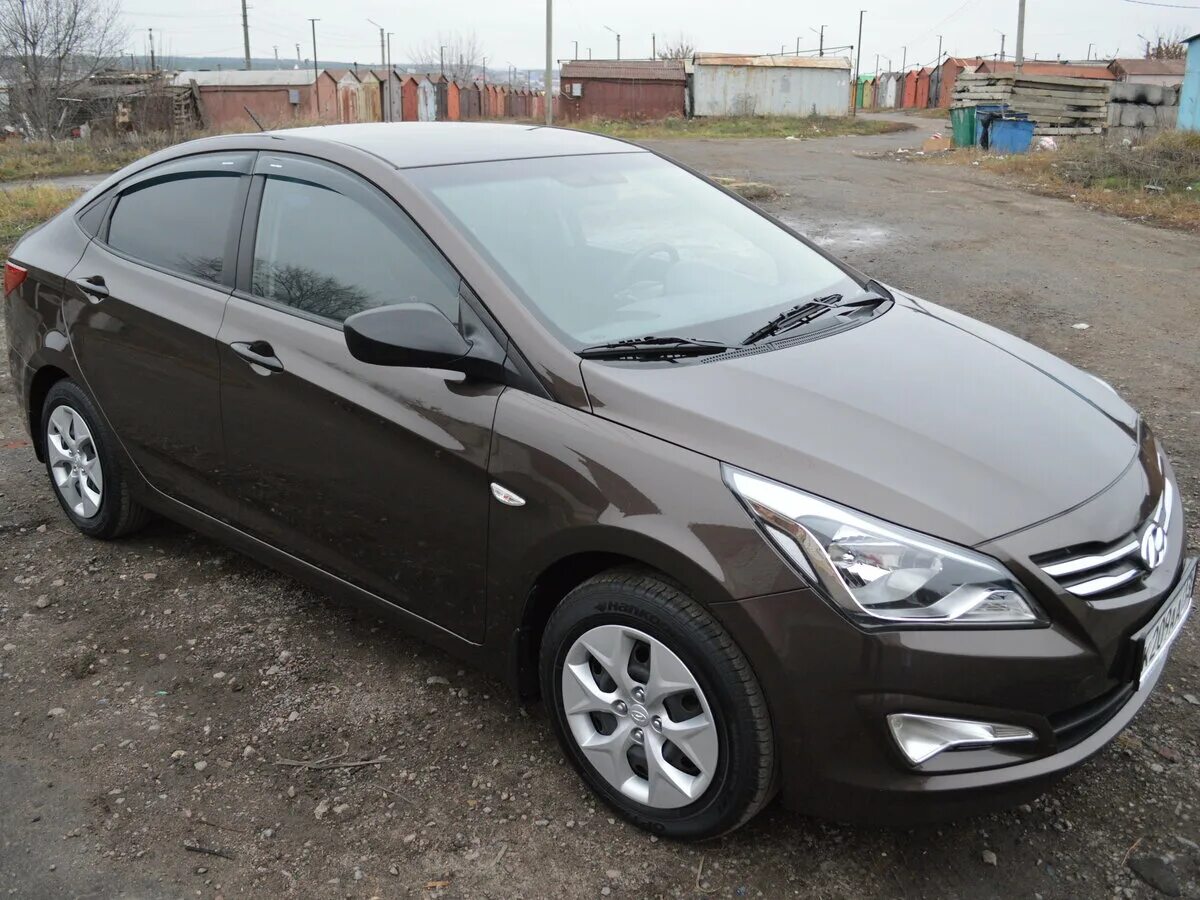 Hyundai solaris воронеж. хендай солярис с пробегом в спб автомат 1. хендай солярис 2014 1,6. новый хендай солярис 2012. хендай солярис 2013 коричневый.