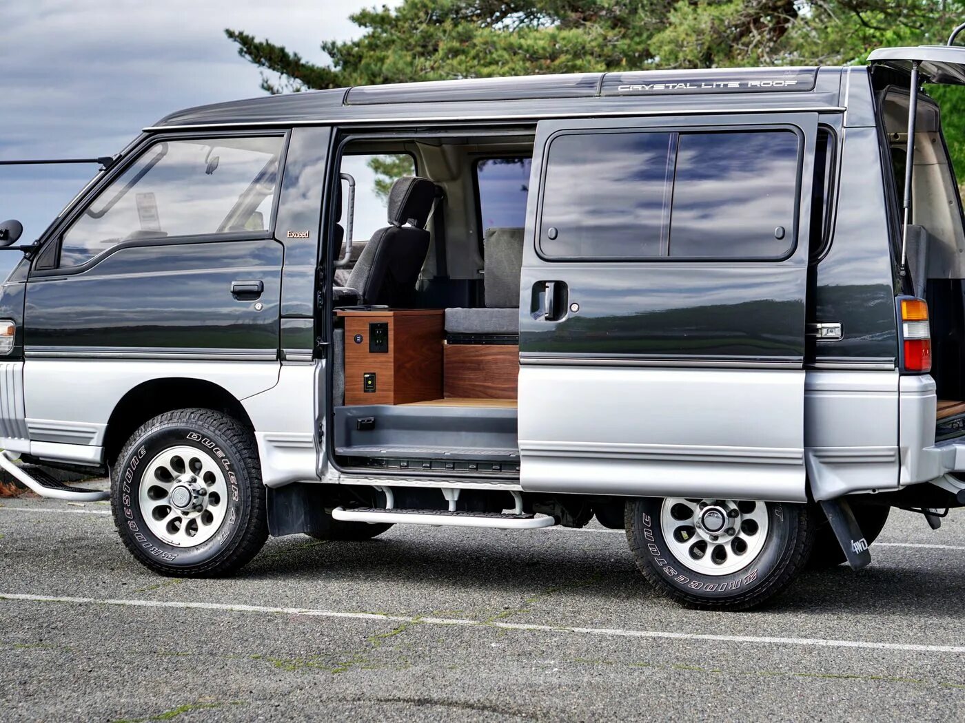 Mitsubishi Delica Camper. Митсубиси Делика Ван. Mitsubishi Delica автодом. Митсубиси Делика фургон. Delica 2024