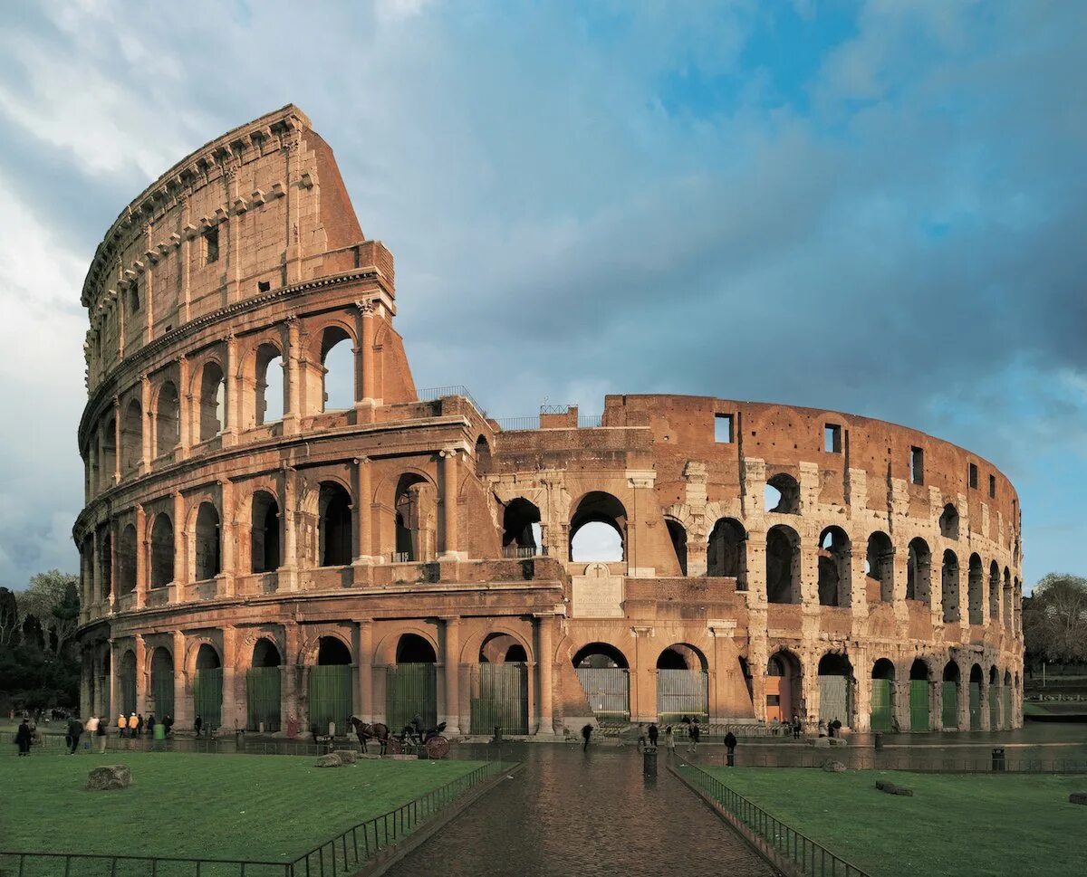 Достопримечательности древнего рима. Колизей (Colosseum) – амфитеатр Флавиев.. Древний Рим амфитеатр Флавиев. Колизей (амфитеатр Флавиев) в Риме. 75—82 Гг. н. э.. Амфитеатр Флавиев Колизей в Риме 80 г.