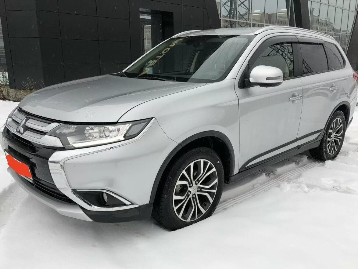 Mitsubishi outlander 2015 год. Mitsubishi Outlander 2015. Mitsubishi Outlander 3 2015. Митсубиси Аутлендер 2015 серый. Mitsubishi Outlander 2015 Рестайлинг.