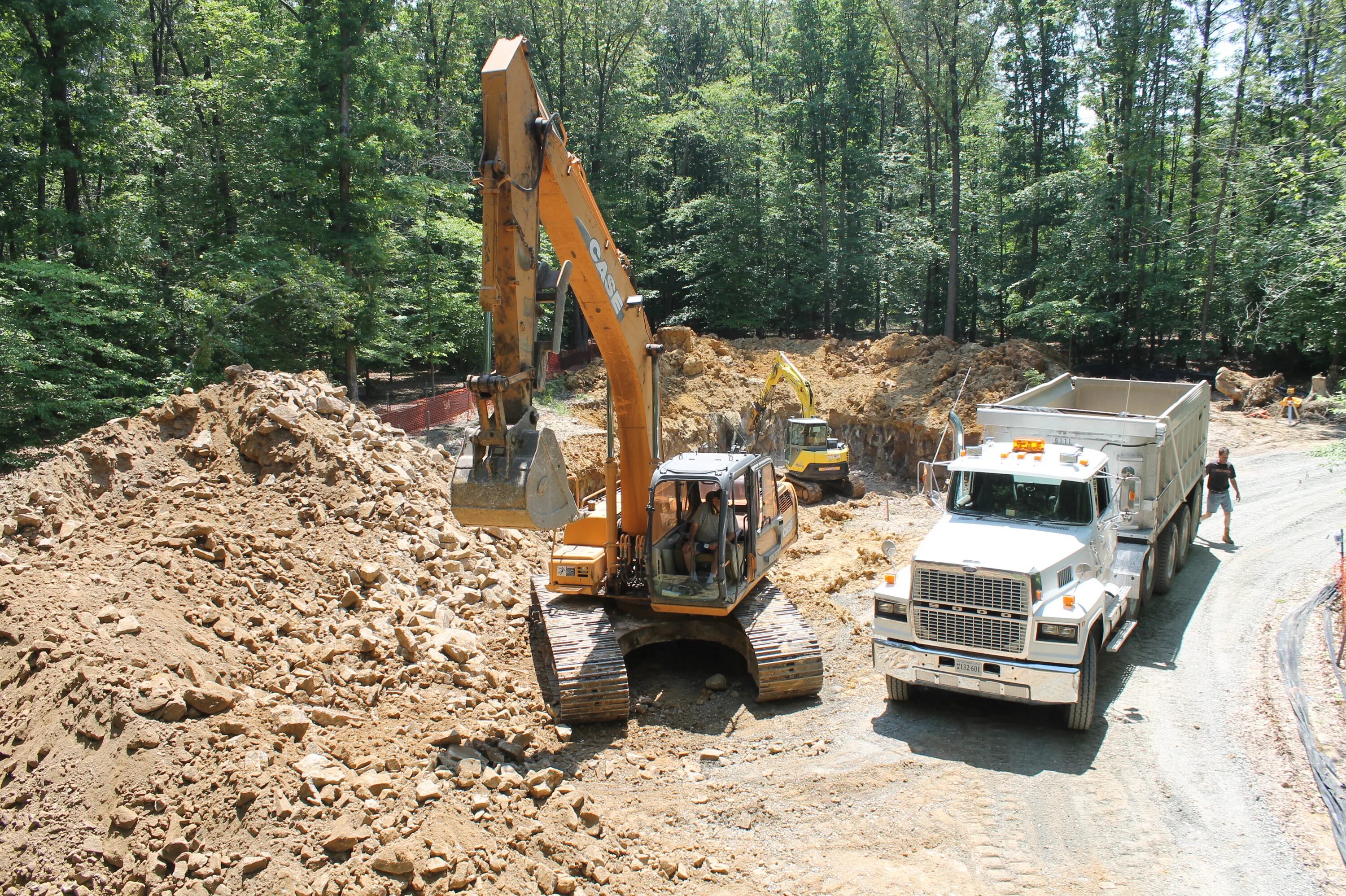 Clearing land. Excavation work Bobcat Moscow Suburban areas. Excavation site. Scale archiology Excavation. Demolition of the Foundation.