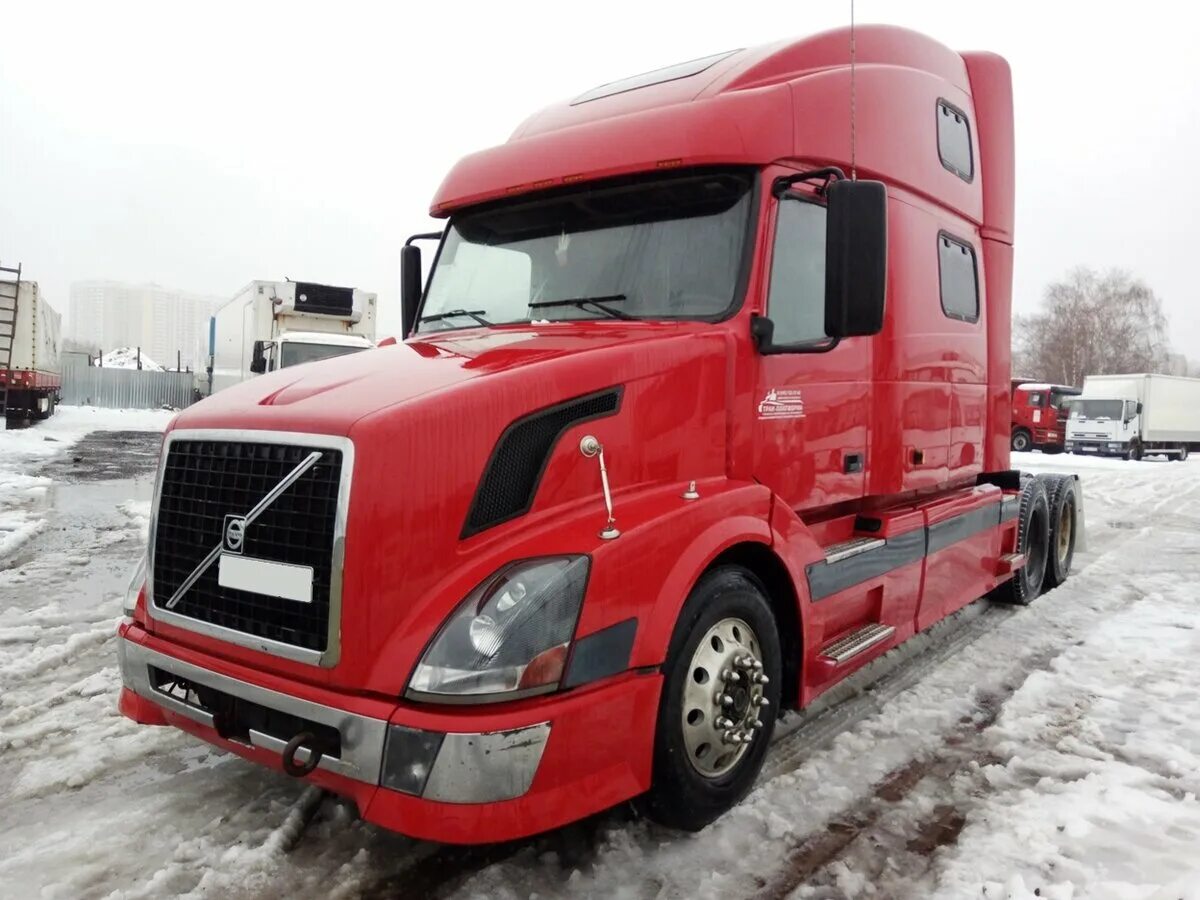 Авито ру бу тягач. Седельный тягач Вольво VNL. Volvo VNL 1999. Тягач Вольво внл. Volvo VNL красный.