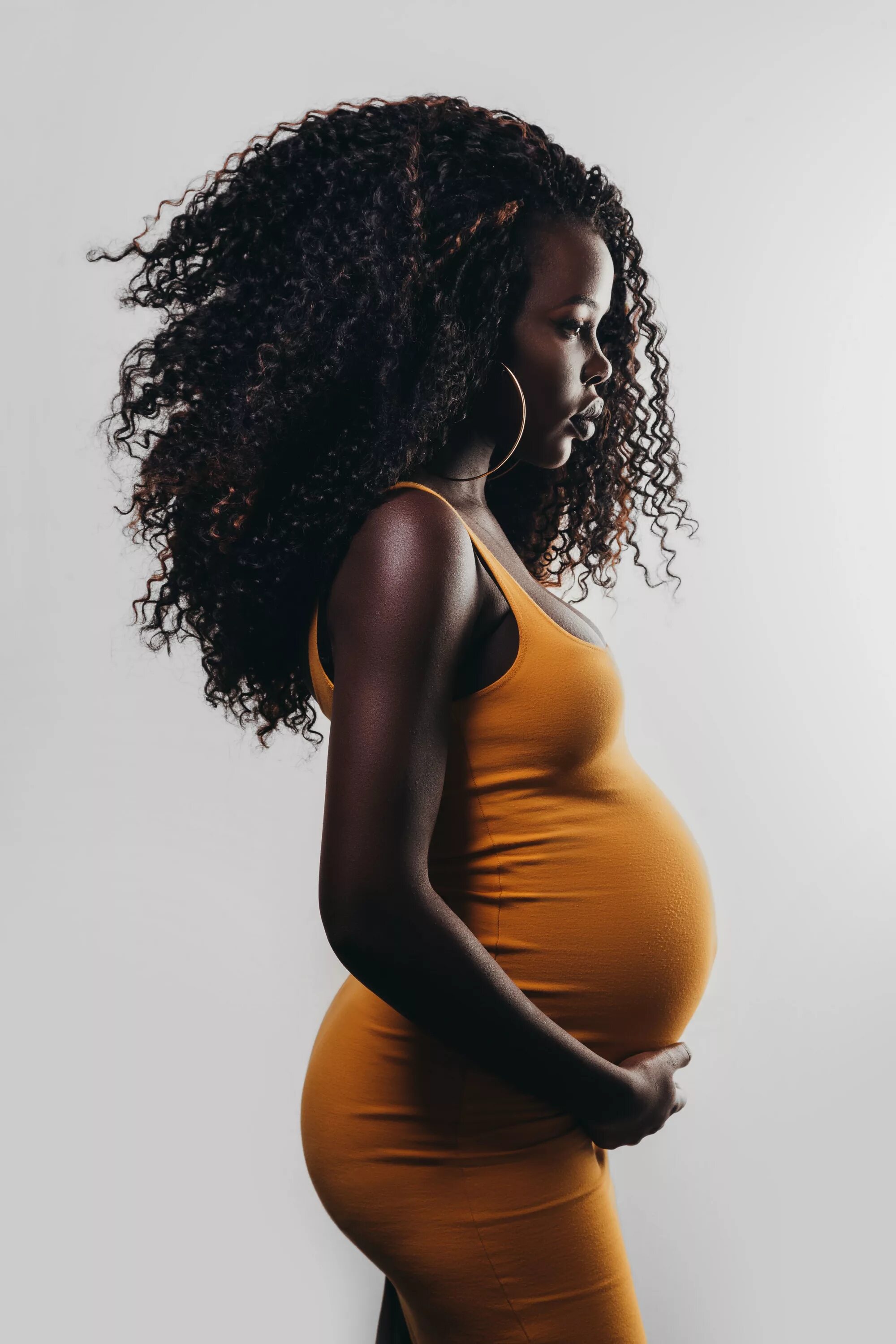 Беременные африканки. Беременные афроамериканки. Женщины афроамериканки. Woman impregnated