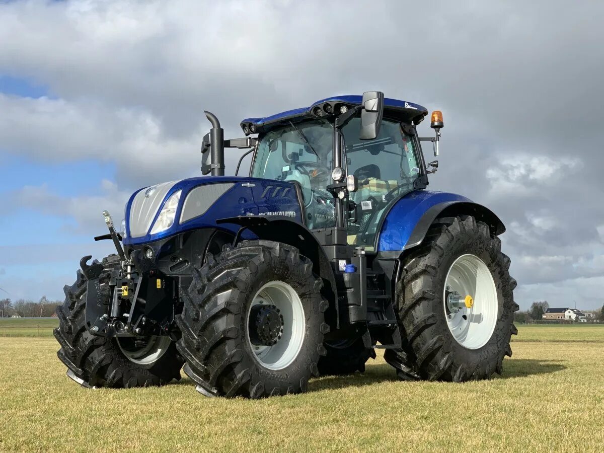 New holland t. Нью Холланд трактор 7060. Трактор New Holland t7. Трактор New Holland t7.270. Трактор New Holland t90630.