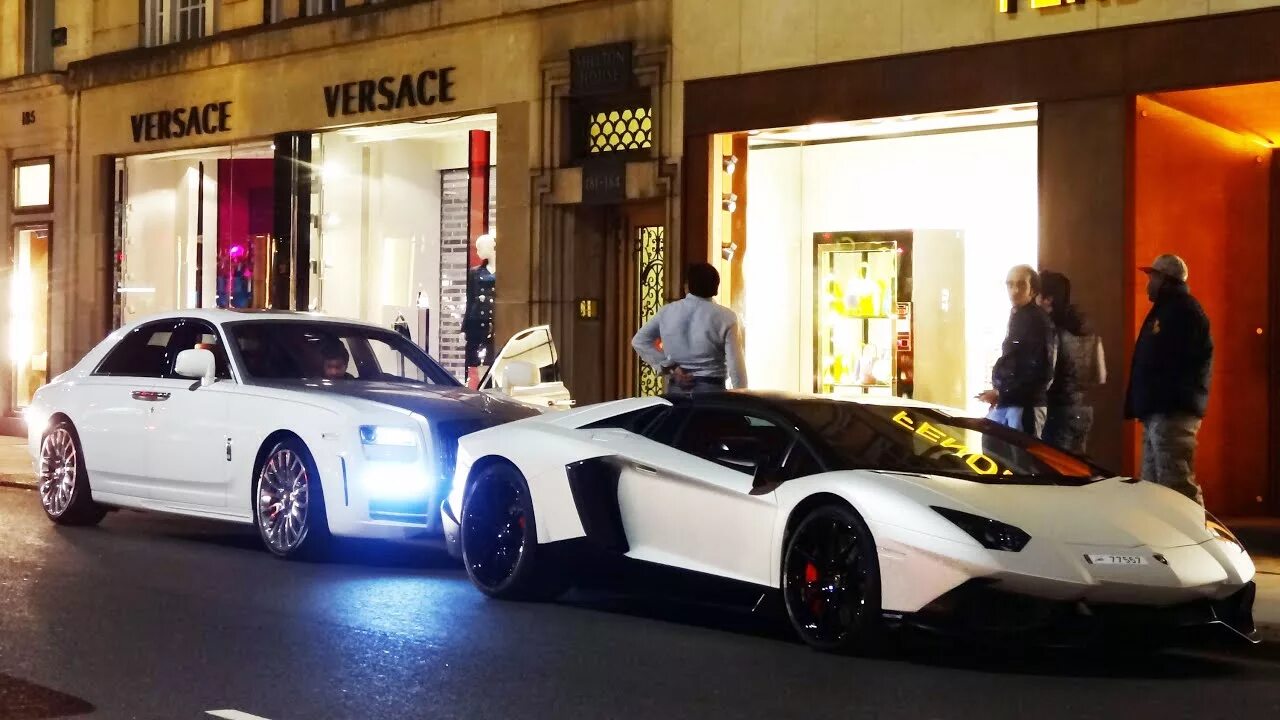 Суперкары в лондоне. Lamborghini aventador bugatti veyron rolls royce. Бентли и роллс ройс. Кадиллак ламборгини. Мейвезер роллс ройс.