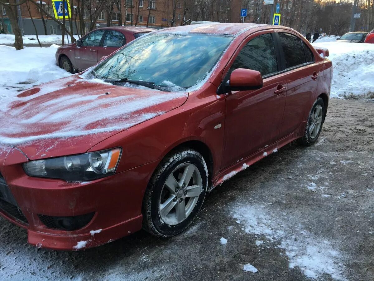 Купить лансер в московской области. Mitsubishi Lancer 10 красный. Мицубиси Лансер 10 красный. Митсубиси ланцер 10 красная. Лансер 10 красный.