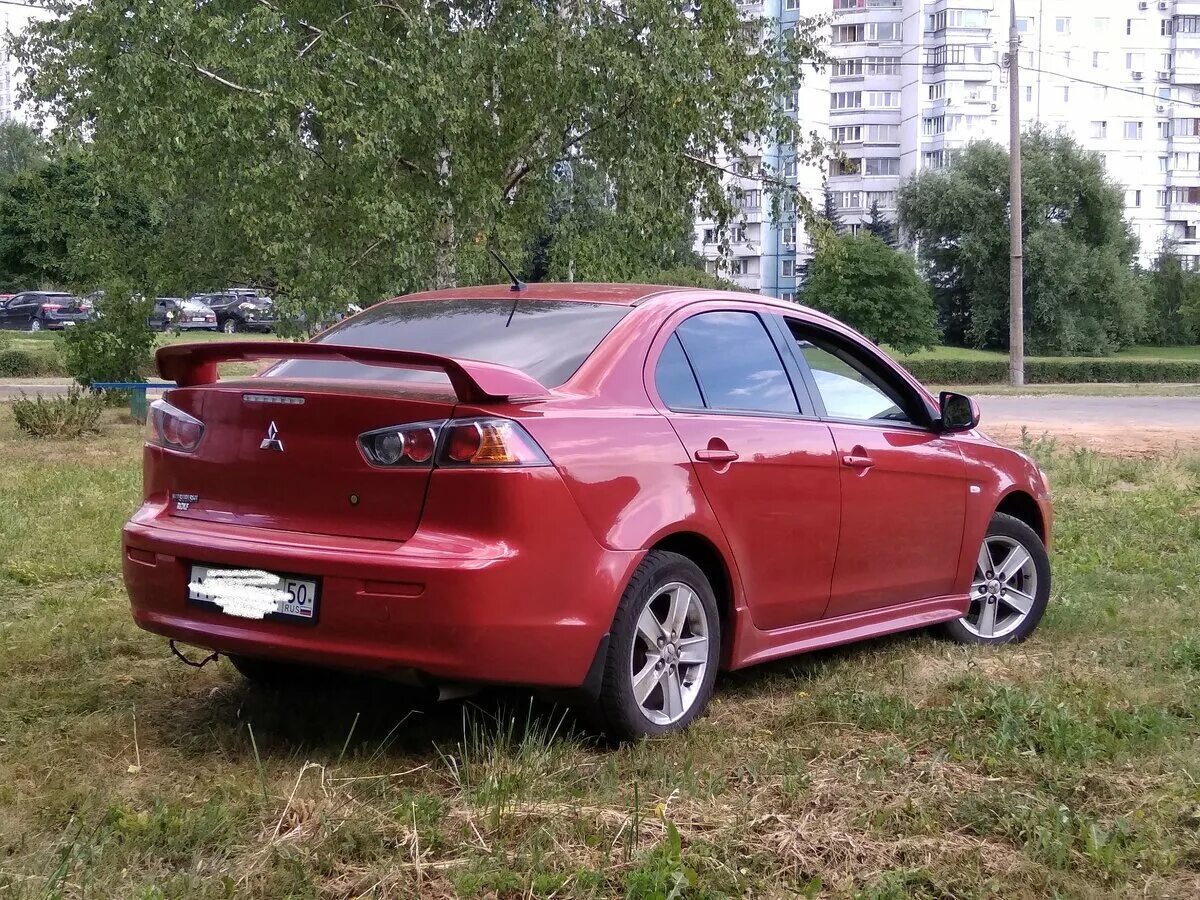 Mitsubishi lancer 10 размеры. Митсубиси Лансер 10 красный. Митсубиси ланцер 10 красная. Красный Лансер 10 Рестайлинг. Лансер 10 Рестайлинг.