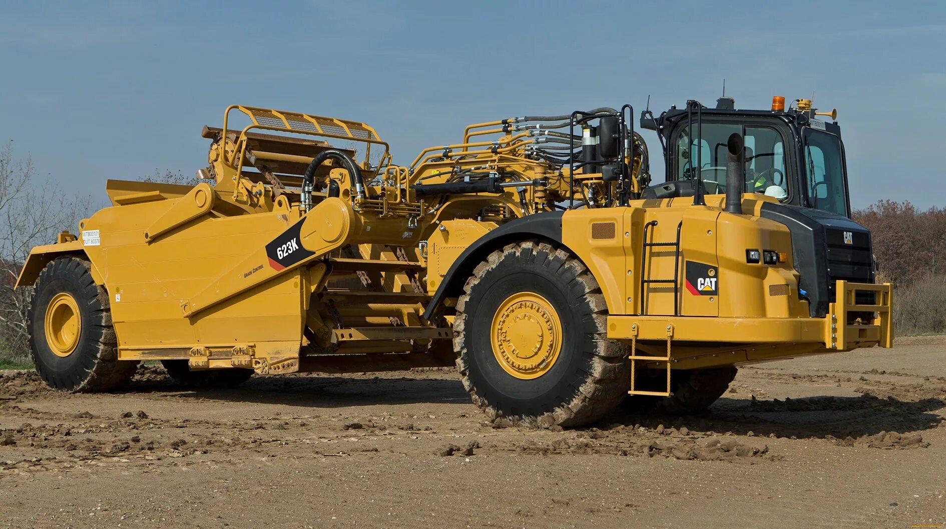 скрепер caterpillar 637f. самоходная транспортная машина. скрепер самоходный моаз-6014. болотоход газ 34039 ирбис. скрепер самоходный моаз-60148.