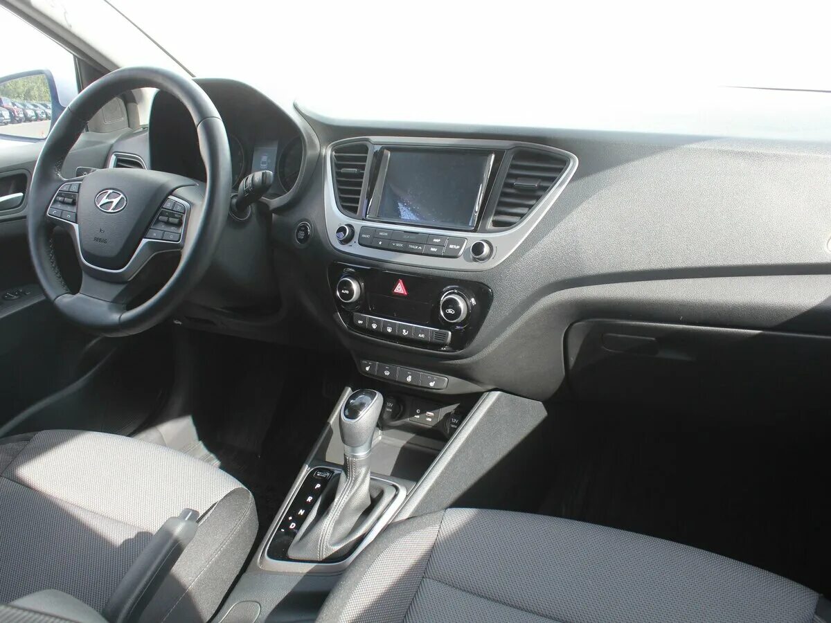 Hyundai solaris 2014 рестайлинг. Hyundai solaris 2 elegance. Hyundai solaris 2021 комплектации. Хендай солярис комплектация элеганс 2021. Хендай солярис элеганс 2022.