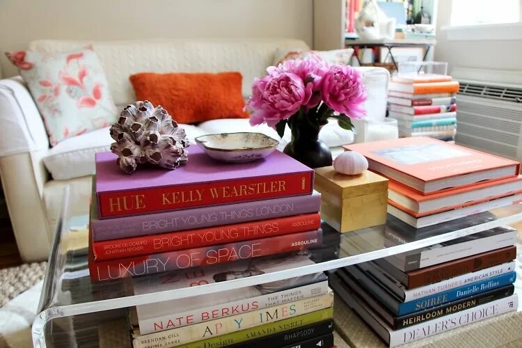 There three books on the table. Стол из книг. красивый стол из книг. coffee table book. book a table.