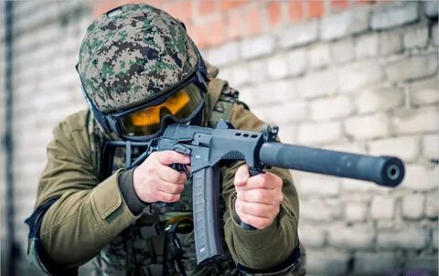 Картинка военного с оружием