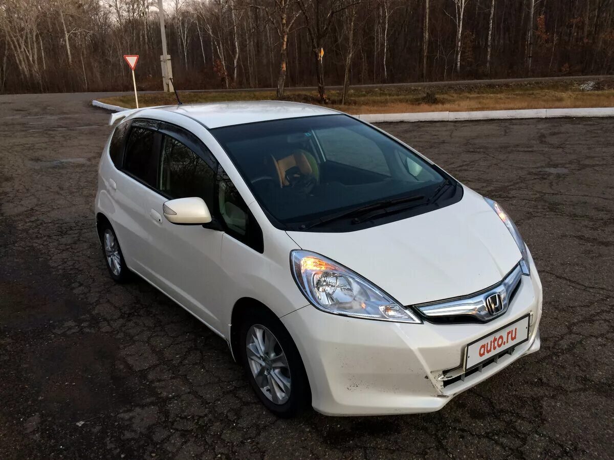 Купить хонда фит в новосибирске. Honda Fit Hybrid 2011. Honda Fit 2011 гибрид. Хонда фит гибрид 2011. Honda Fit 2011.