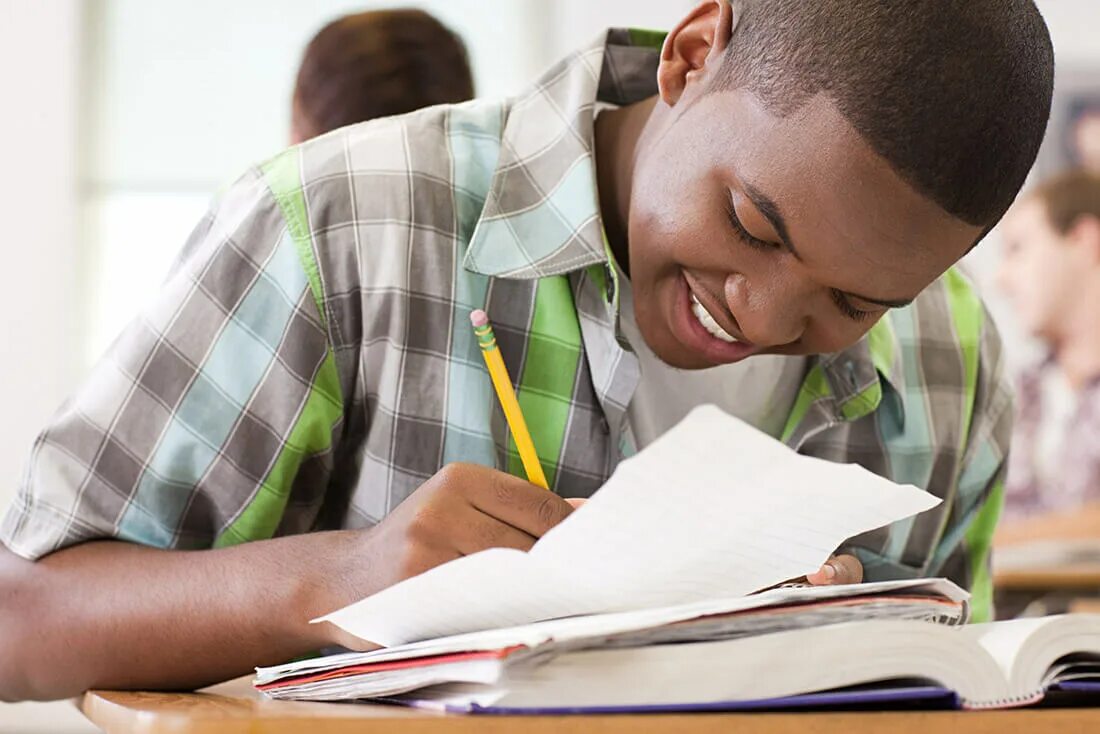 Write what you write in up. Students write. person writing. student writing. writing exam.