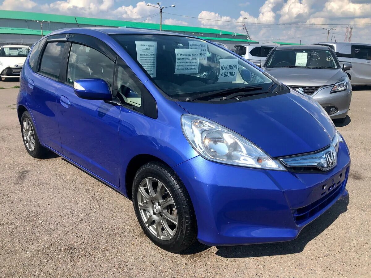 Фит 2012 год. Honda Fit 2012. Хонда фит гибрид 2012. Хонда фит 2012г. Хонда фит 1.3 гибрид 2012.