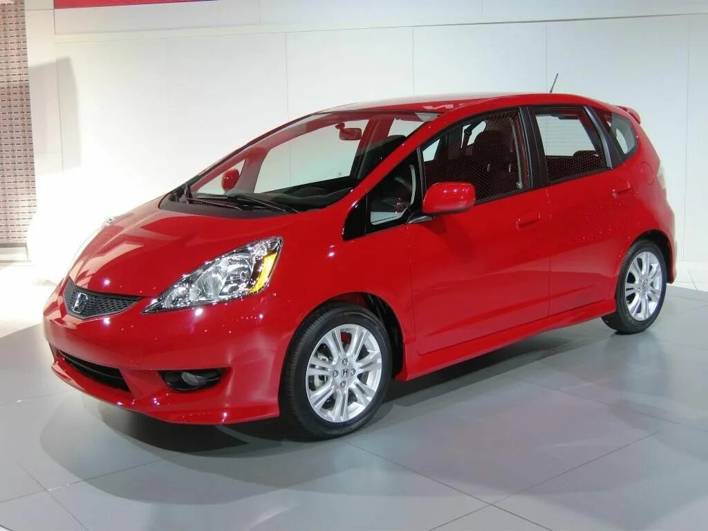 Купить машину хонда фит. Honda Fit 2009. Honda Jazz Hybrid 2009. Honda Fit 2011. Honda Jazz Hybrid 2009 Pink.