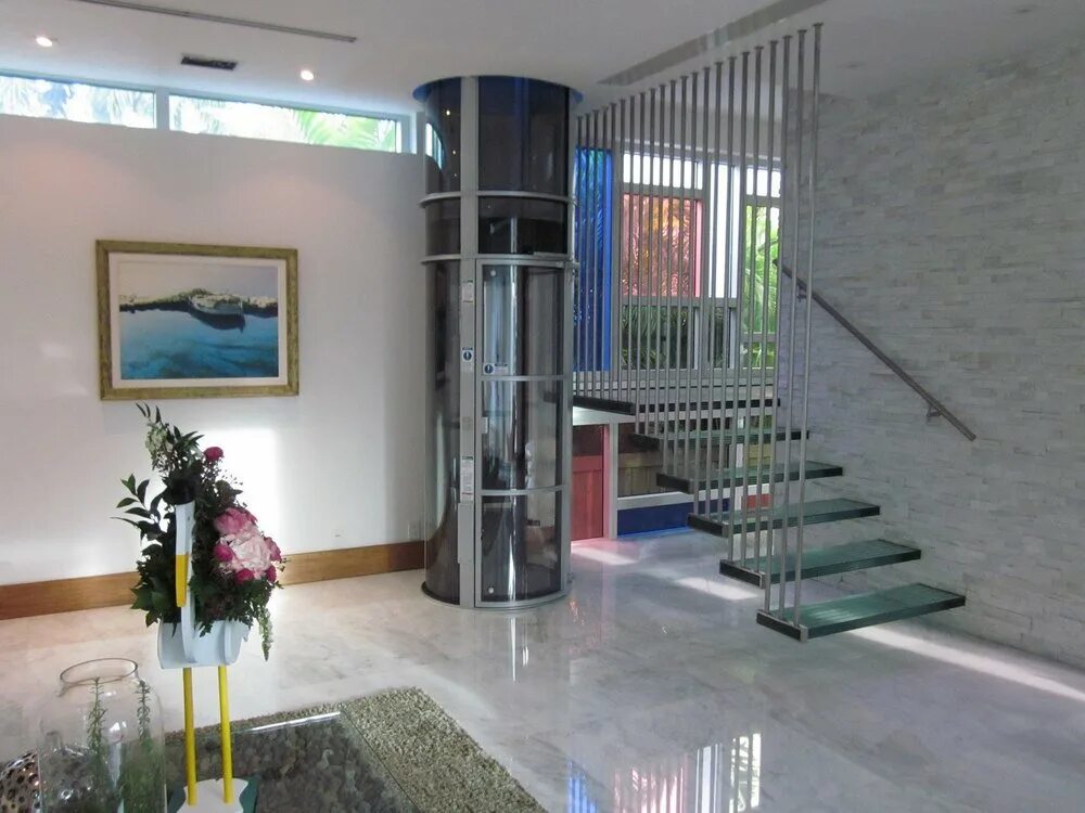 Панорамный лифт для коттеджа. Лифт в доме. Панорамный лифт для коттеджа. Коттеджный лифт kleemann. Круглый панорамный лифт для коттеджа.