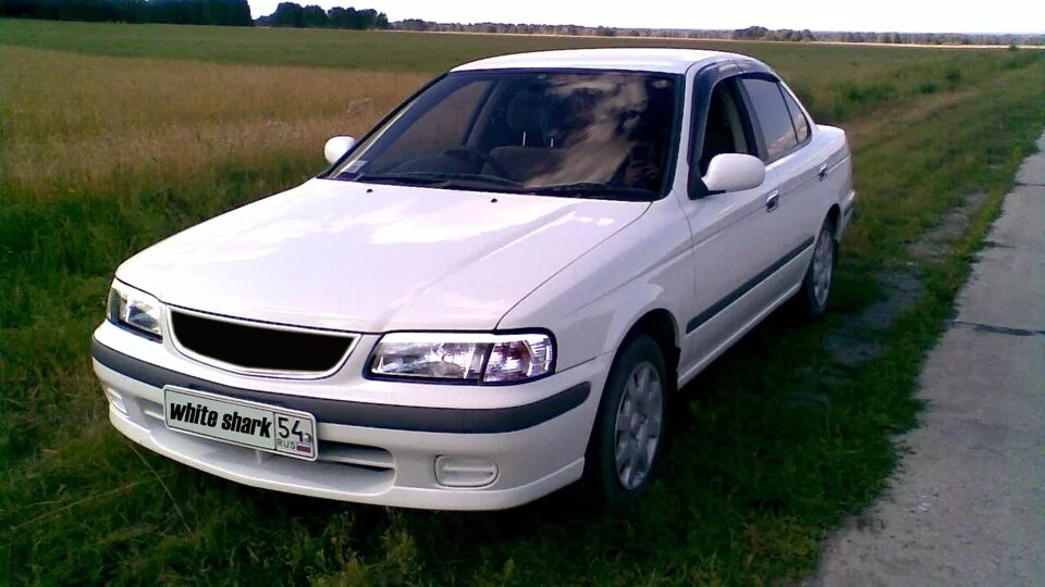 Ниссан санни край. Nissan Sunny b15. Ниссан Санни б15. Кузов Ниссан Санни b15. Nissan Sunny b15 Рестайлинг.