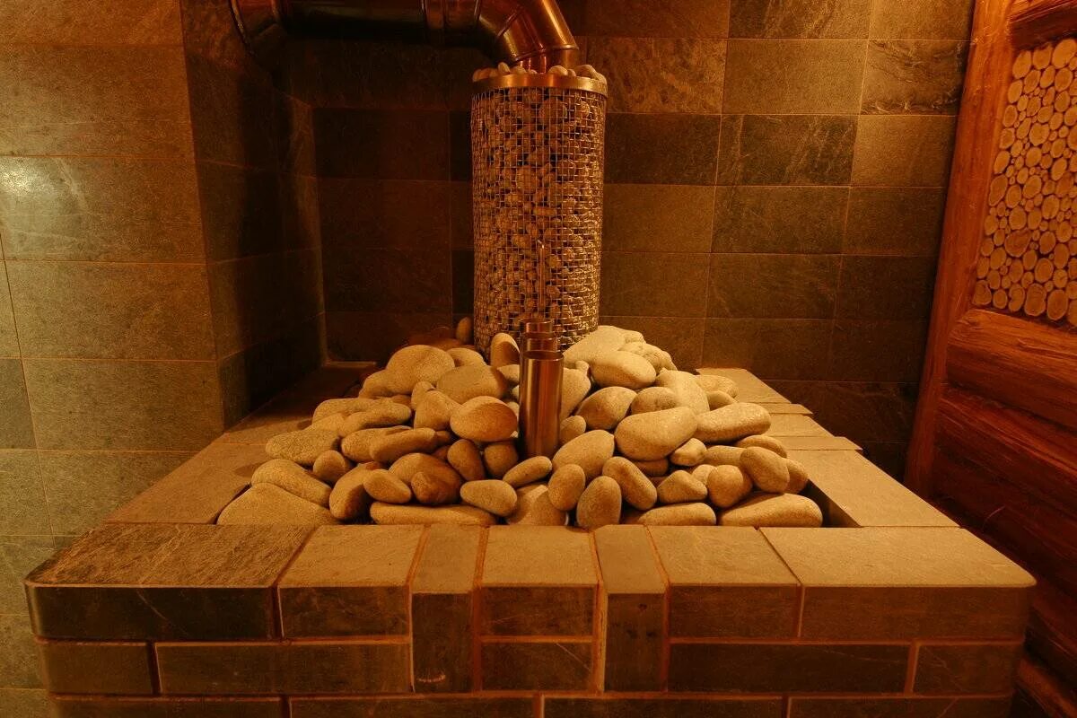 Камни в печь для бани купить. Камни для бани. Камни для печки в баню. Каменная печка для бани. Камни для каменки в баню.