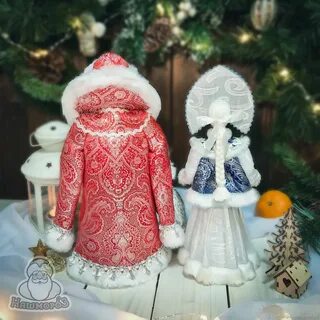 Фигурки деда мороза и снегурочки
