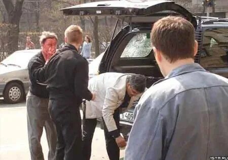 бизнесмен покушение