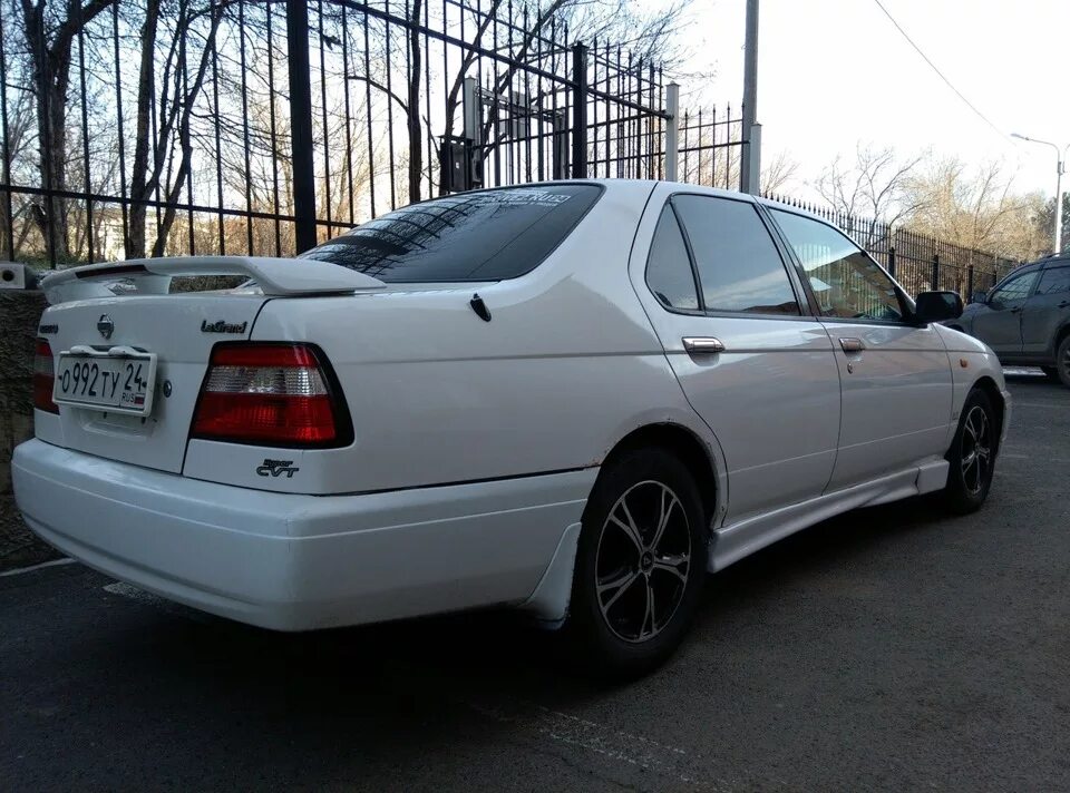 Ниссан санни 14 кузов. Nissan Bluebird u14. Ниссан Блюберд 14 кузов. Спойлер на Ниссан Блюберд u14. Bluebird u14 спойлер.