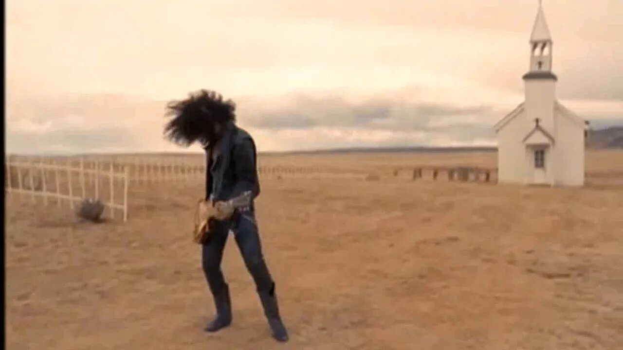 Клип смысл жизни. Сила November Rain. Эксл Роуз November Rain. Слэш November Rain. Guns n Roses November Rain.