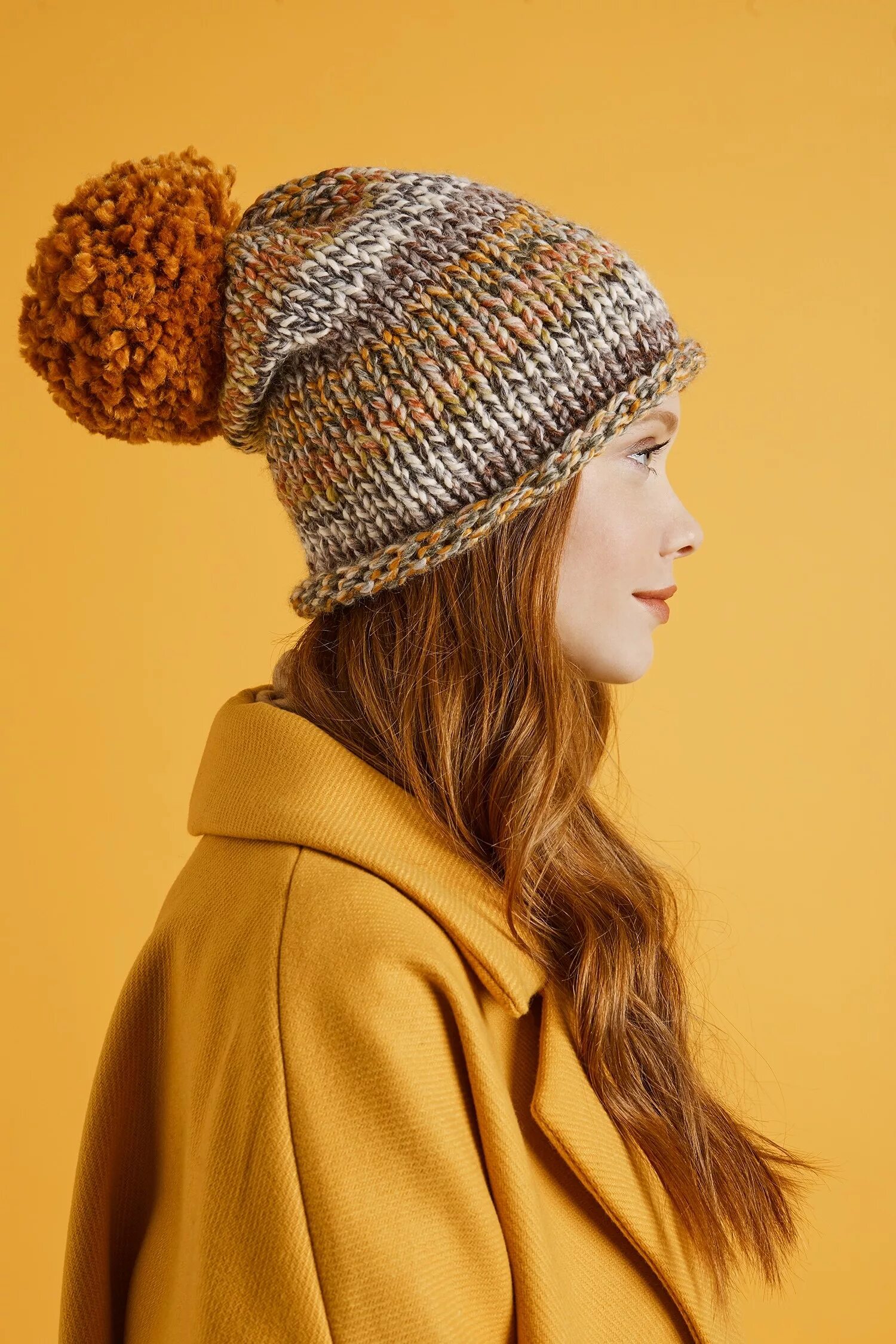 Simple hats. Warm Winter Yellow Knitted hat.