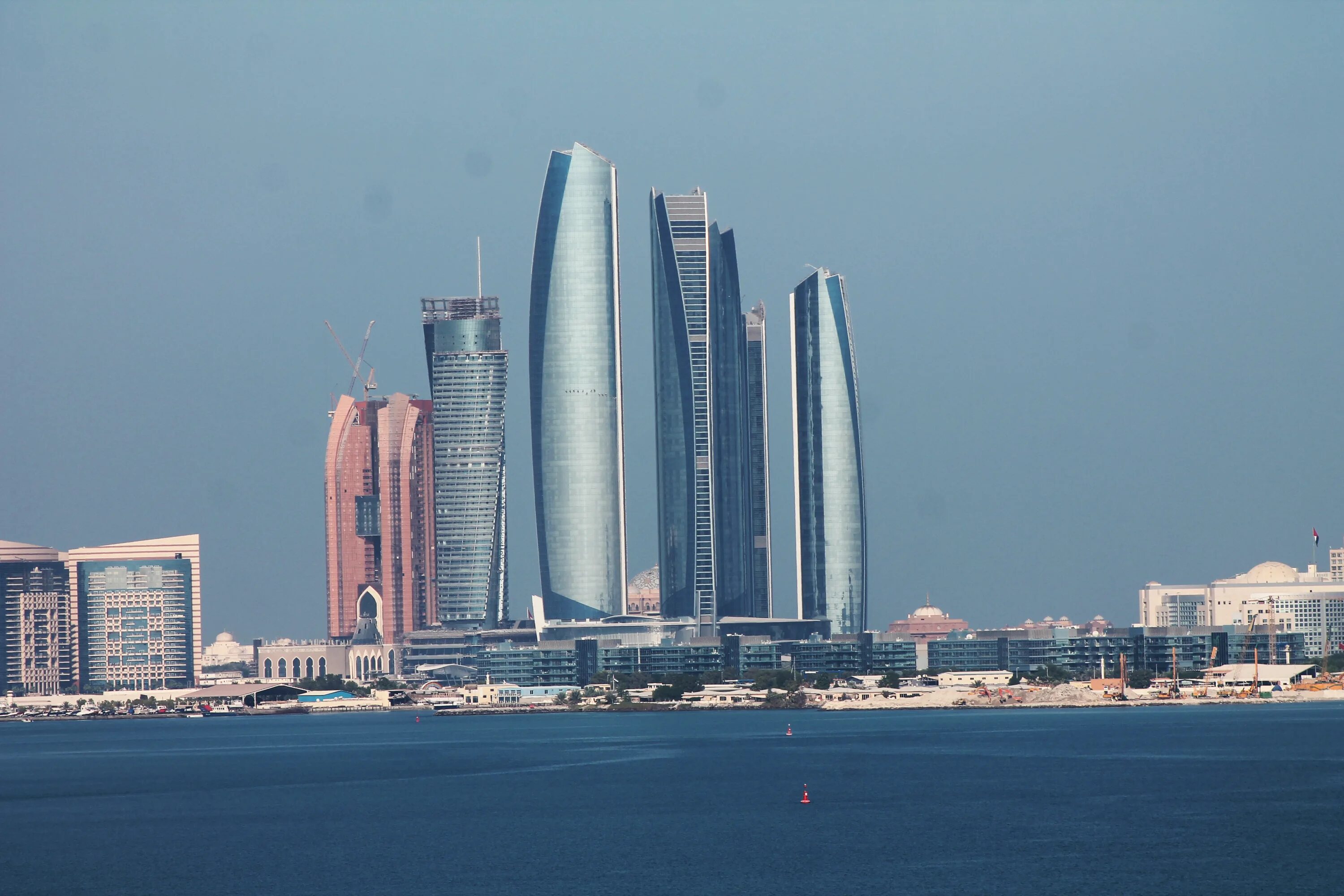 Etihad towers. Etihad towers в абу-даби. небоскреб этихад. uae etihad towers abu dhabi. абу-даби оранжевое здание.