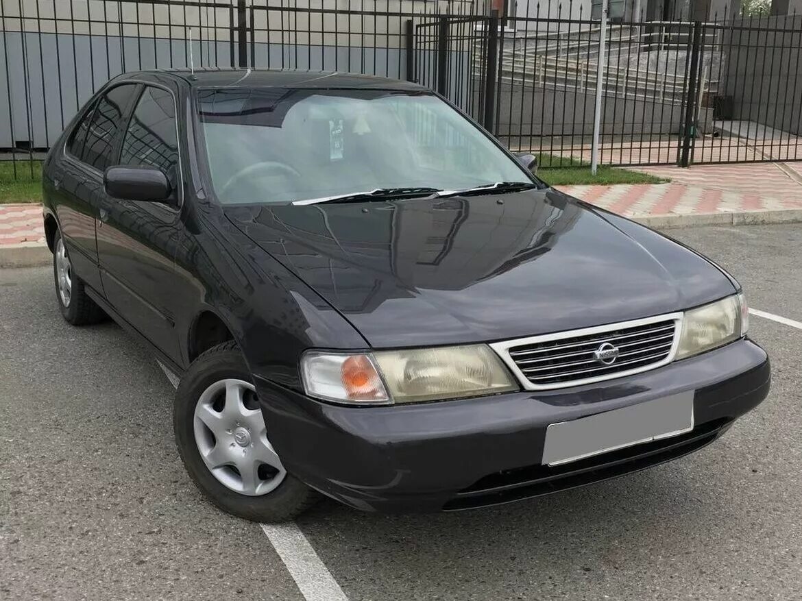 Ниссан санни 14 кузов. Nissan Sunny b14. Nissan Sunny 1998. Nissan Sunny 1994.