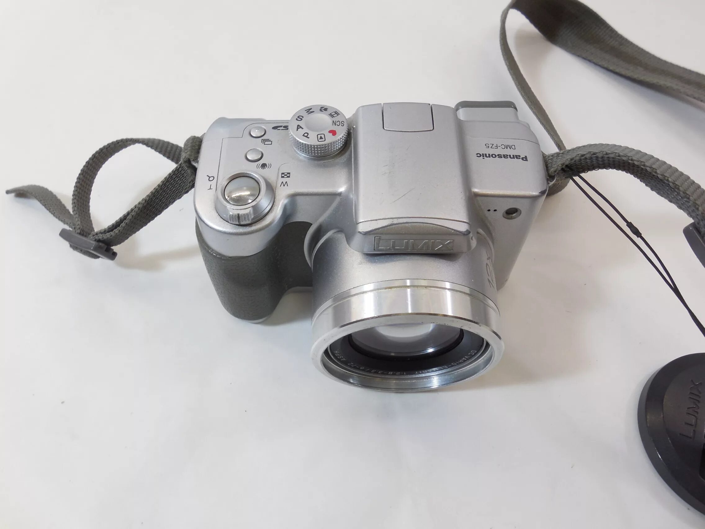 Panasonic lumix dmc fz7. Panasonic dmc-fz5. panasonic lumix dmc-fz2. panasonic dmc-fz5 разъем. снимки на фотоаппарат panasonic dmc fz5.