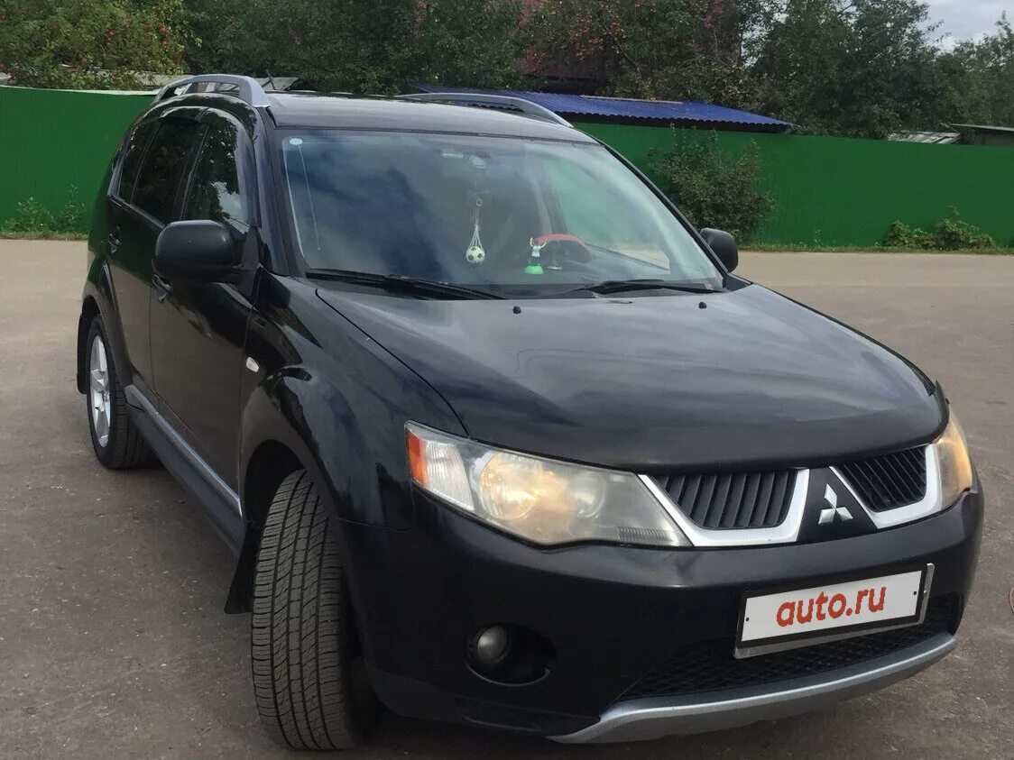 Аутлендер 2008 2.4 купить. Митсубиши Аутлендер 2008. Mitsubishi Outlander 2008. Мицубиси Аутлендер 2008 черный. Mitsubishi Outlander 2.4 2008.