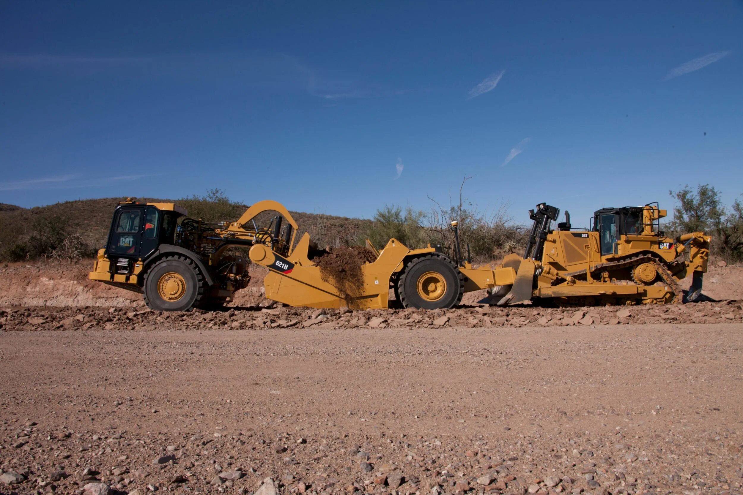 Скрепер Катерпиллер. Caterpillar 621g ковш. Скрепер техника дорожная. Скрепер бульдозер.