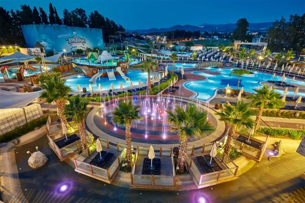 Лучшие недорогие отели турции для отдыха. Самый большой аквапарк в Турции. Парк Нашира Анталия. Кушадасы Турция Белек парк. Аквапарк Кушадасы.