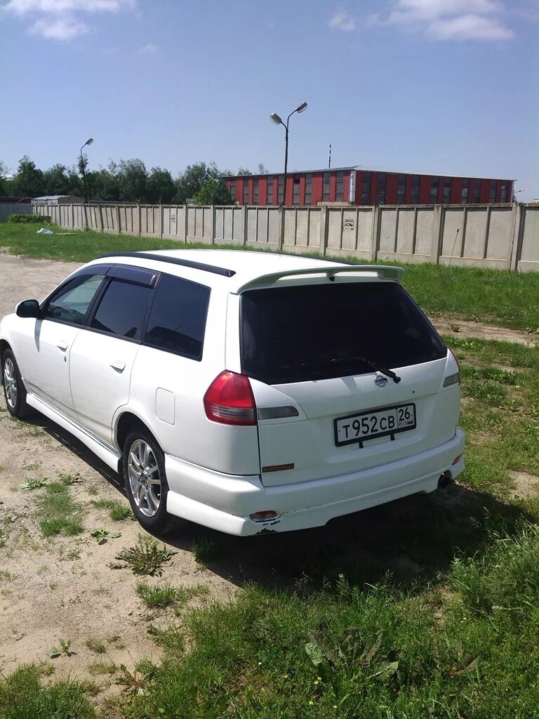 Nissan wingroad 2000 года. Ниссан вингроуд 11. Nissan Wingroad y11 Aero. Nissan Wingroad y11 белый. Ниссан вингроуд 2001.