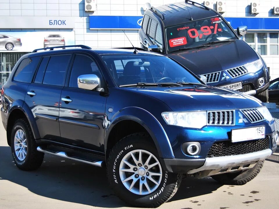 Mitsubishi pajero sport 2012. Mitsubishi Pajero Sport 2. Mitsubishi Pajero Sport 2008. Мицубиси Паджеро спорт 2011. Mitsubishi Pajero Sport 2.5.