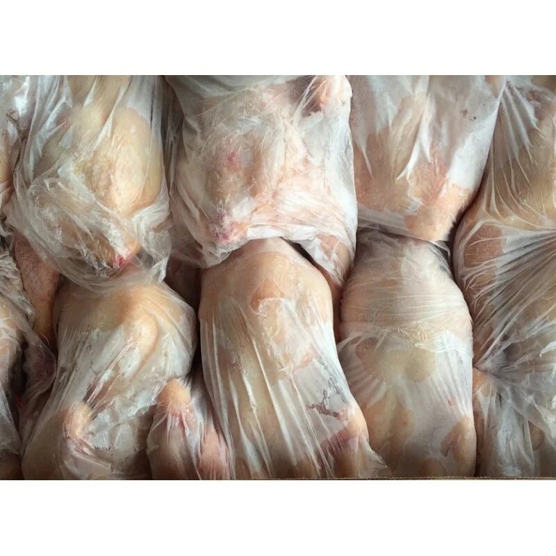 Замороженная курица. Упаковка мяса птицы. Упаковка тушек птицы. Мясо птицы замороженное