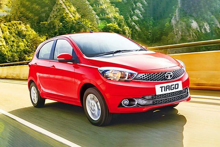 Тата та самая. Tata tiago. tiago машина. тата моторс. тата тиаго фото.