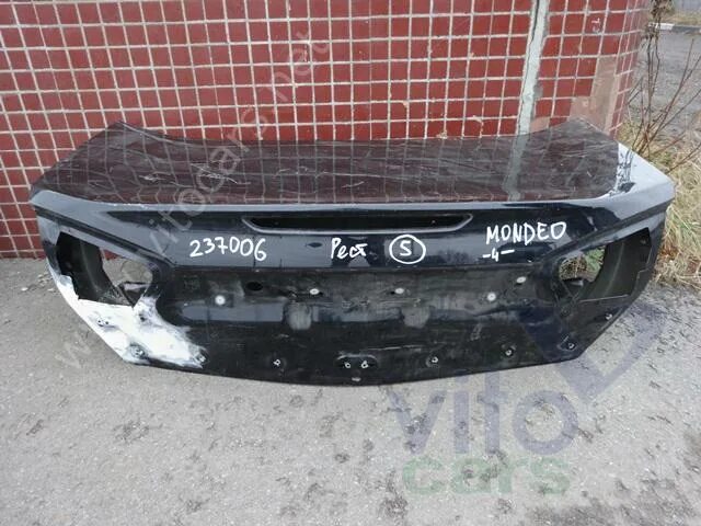 Крышка багажника ford mondeo 4. Крышка багажника форд фокус 2. Накладка крышки багажника форд мондео 4. Крышка багажника на форд мондео 4. Крышка багажника на форд мондео 4.