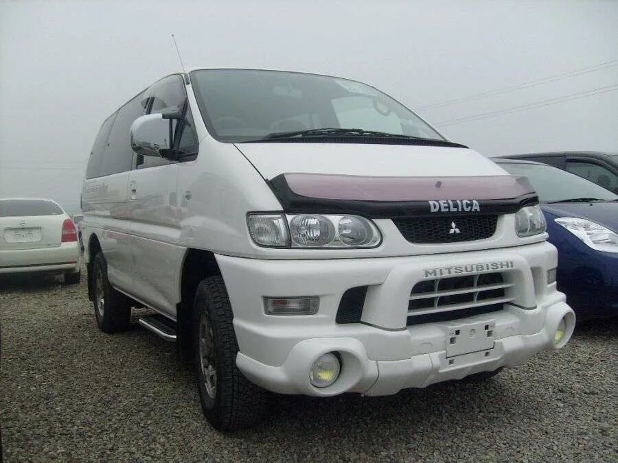 Купить делику левый руль. Митсубиси Делика 2004. Mitsubishi Delica левый руль. Митсубиси Делика 4х4 левый руль. Митсубиси Делика 4 с левым рулем.