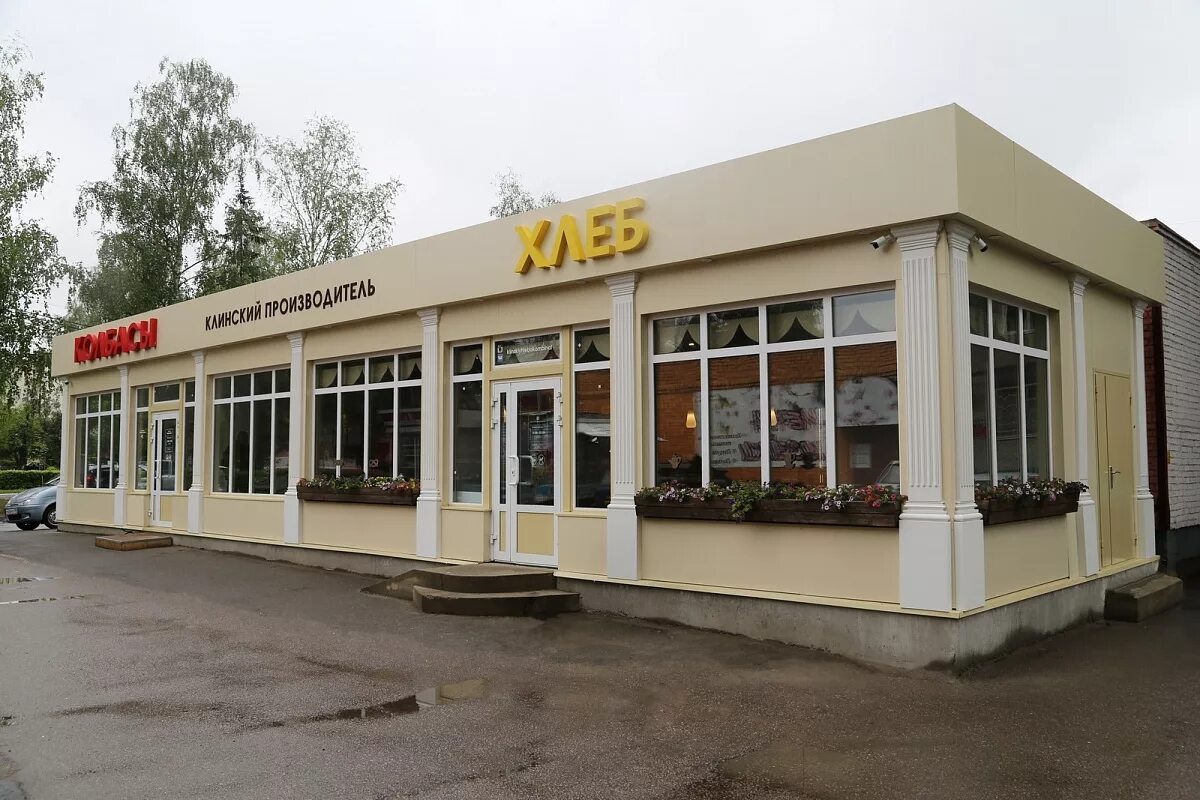 фасад административного здания. фасад торгового павильона. отдельно стоящие торговые здания. фасад офисного здания. легковозводимые здания под кафе.