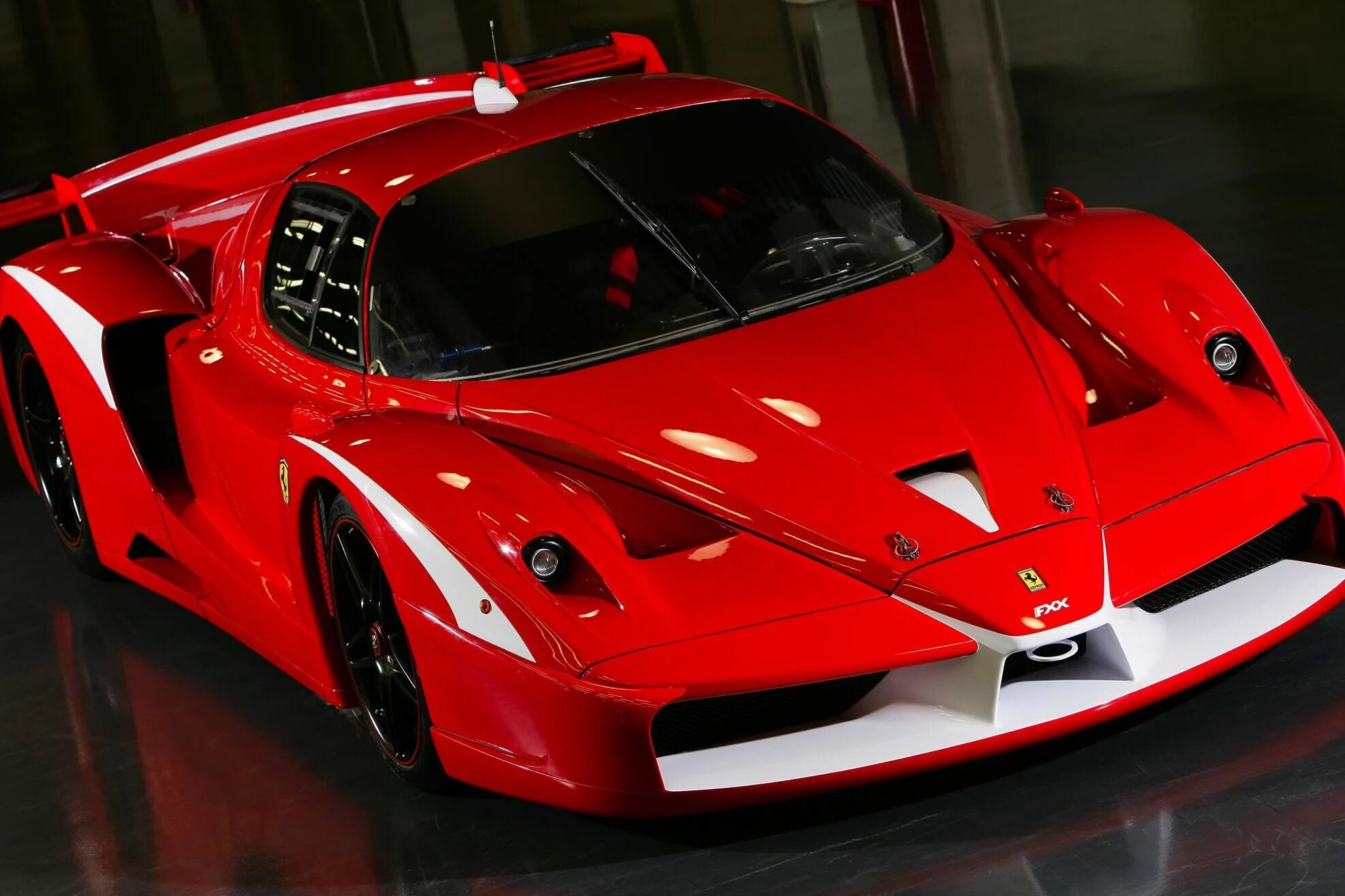 Картинки самых. Машина Ferrari FXX 2020. Ferrari FXX 2005. Феррари FXX evoluzione. Ferrari FXX оранжевая.