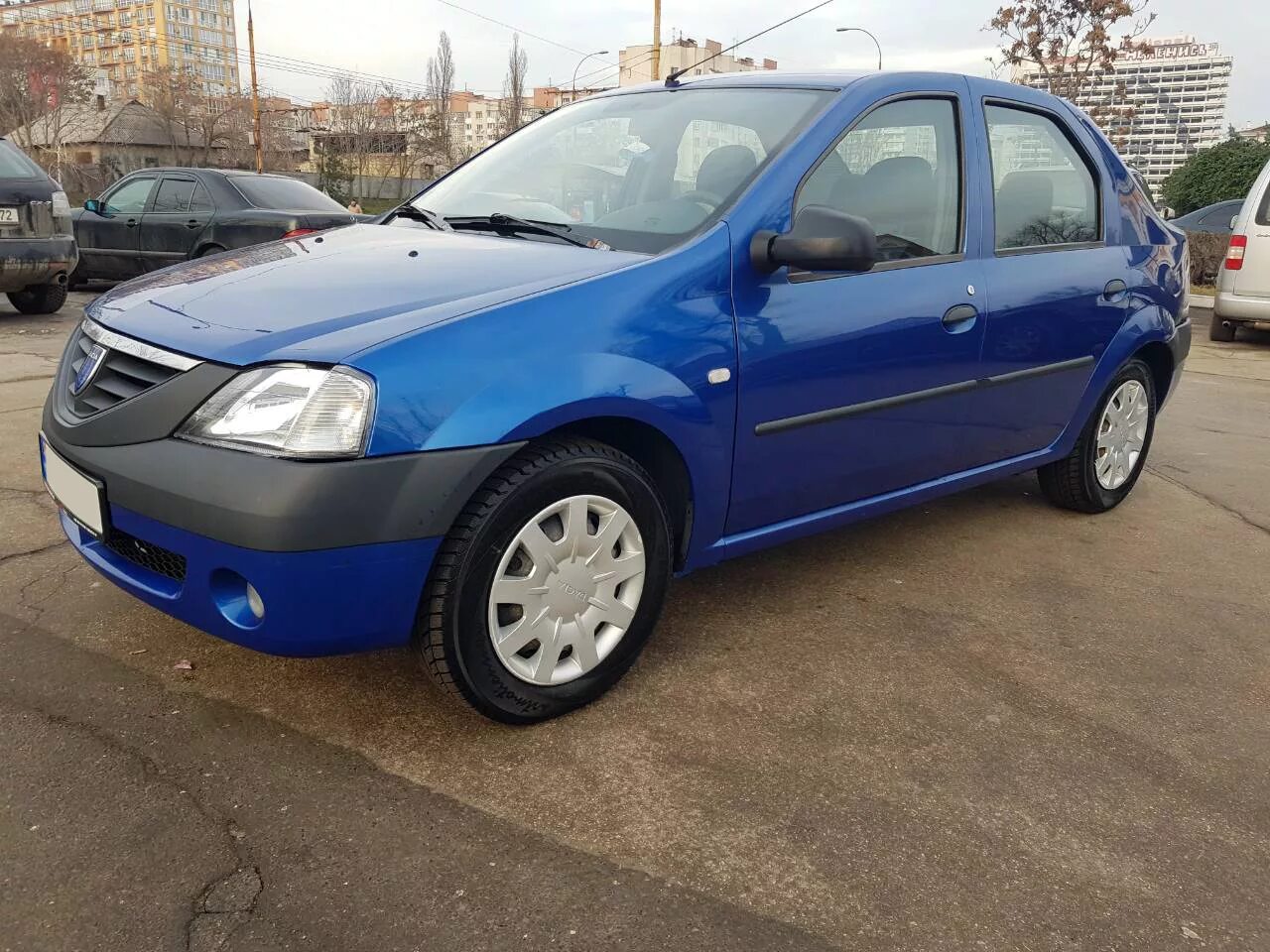 Рено логан 7 года. Рено Логан 2007. Dacia Logan 2004. Dacia Logan 2007. Рено Логан Дачия.