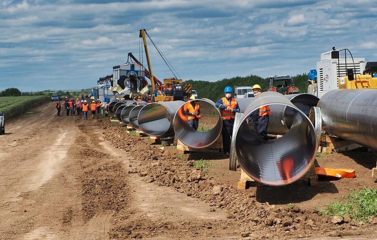 Газовая труба. Строительство магистрального газопровода. Стройка нефтепровода. Строительство трубопровода газа. Стройка нефтепровода.