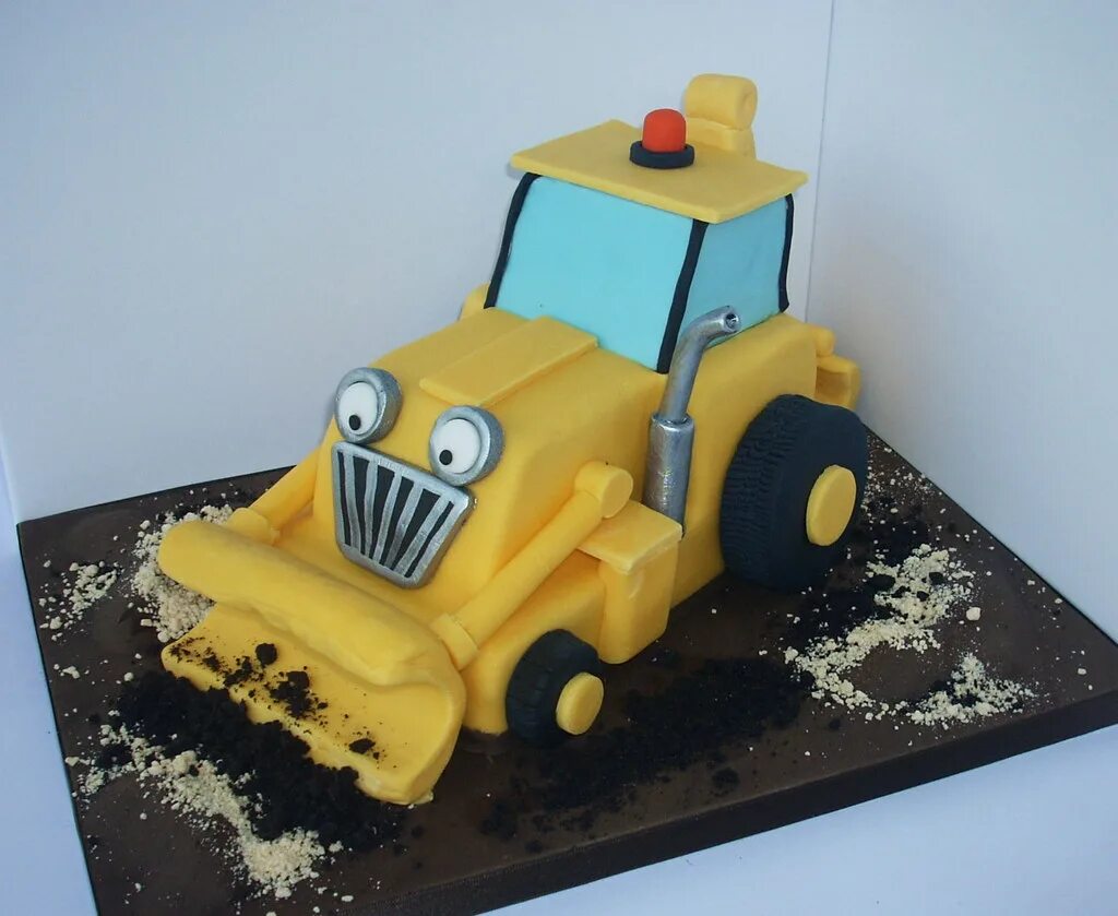 Торты тракторы фото. Торт «трактор». Торт с трактором для мальчика. Торт в форме трактора. Торт с бульдозером для мальчика.