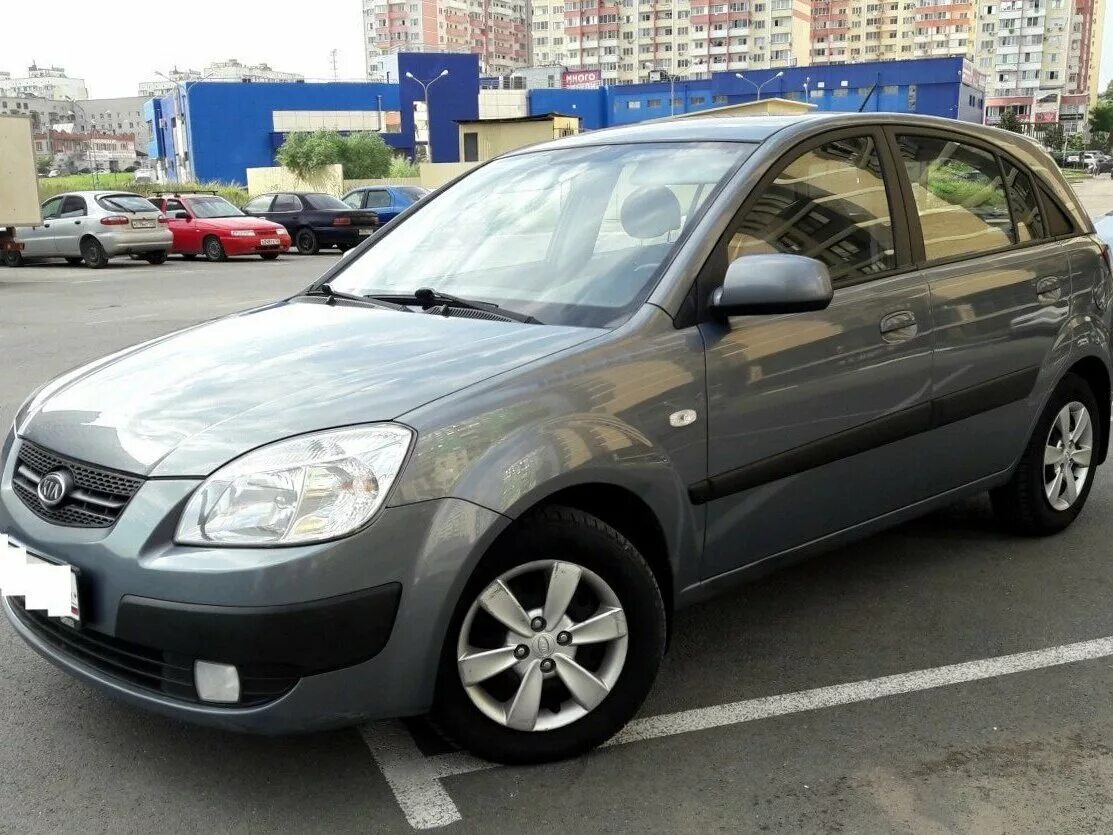 Rio 2009. Kia Rio 2009 1.4. Kia Rio 2009 серый хэтчбек. Киа Рио 2009 серый. Киа Рио 2 серая.