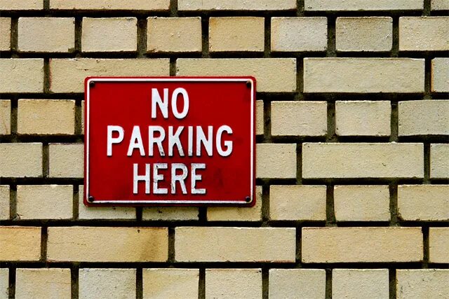 Parking illegally. Parking Policy. Don't Park here. Park here sign. 1 you park here