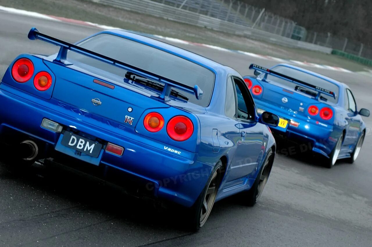 R 34 28. Nissan skyline r34 зад. Nissan skyline r34 gtr v-spec. Nissan r34. Nissan skyline gtr r34.