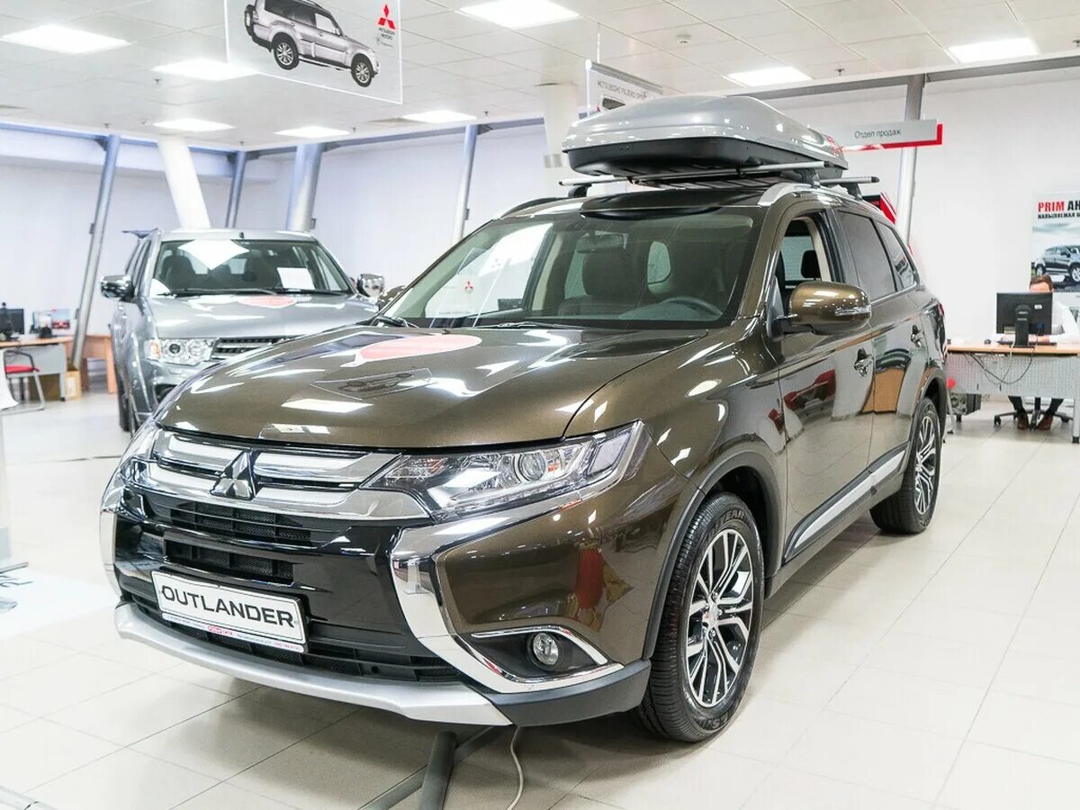 Митсубиси аутлендер цвета. Аутлендер 3 2018. mitsubishi outlander 2019 коричневый металлик. коричневый аутлендер 2016. митсубиси аутлендер новый коричневый.
